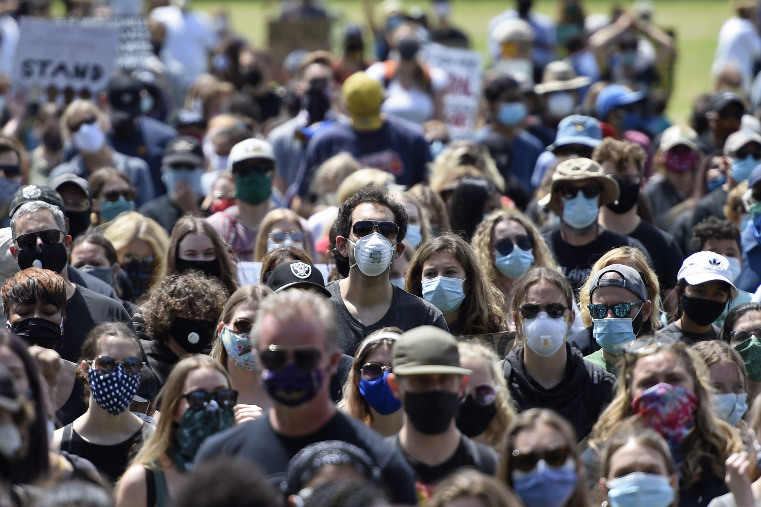 Americans using face masks during rally in the US