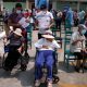 Senior citizens wait to receive a dose of the Pfizer-BioNTech COVID-19 vaccine in Lima, Peru, on March 23 [Sebastian Castaneda/Reuters]